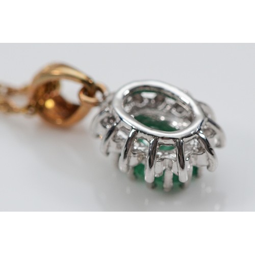 41 - A pair of 9ct gold emerald and diamond cluster earrings with scroll backs, with a matching pendant, ... 