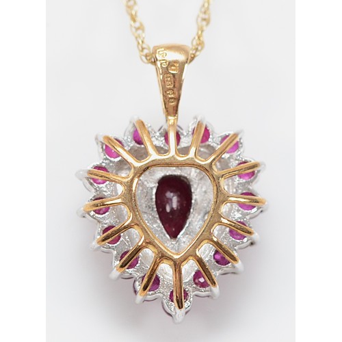 42 - A 9ct gold ruby and single cut diamond pendant on a chain, 2.7g
