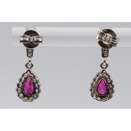 47 - A pair of 9ct white gold single cut diamond and pink sapphire earrings with scroll backs, 17mm, 2g