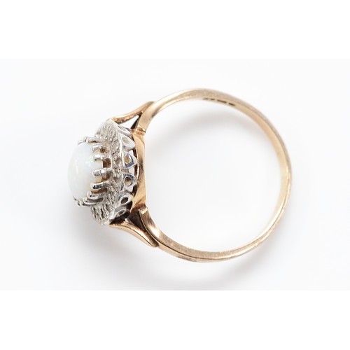 51 - A 9ct gold opal and single cut diamond cluster ring, P 1/2, chip to the opal, 3.9g