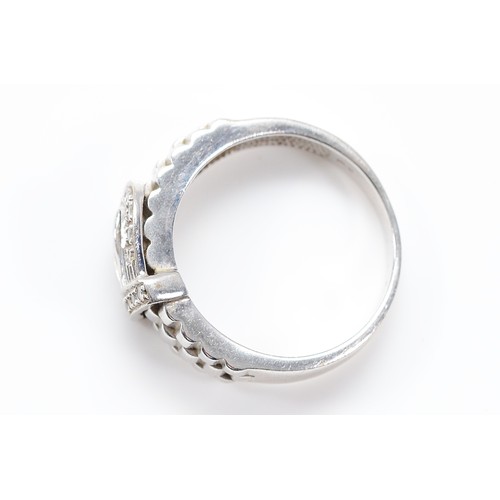 54 - A 9ct white gold brilliant cut diamond buckle ring, S, 6.4g