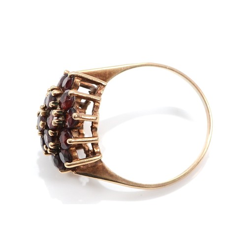 56 - A 9ct gold garnet cluster ring, Birmingham 1973, O, 3.5g
