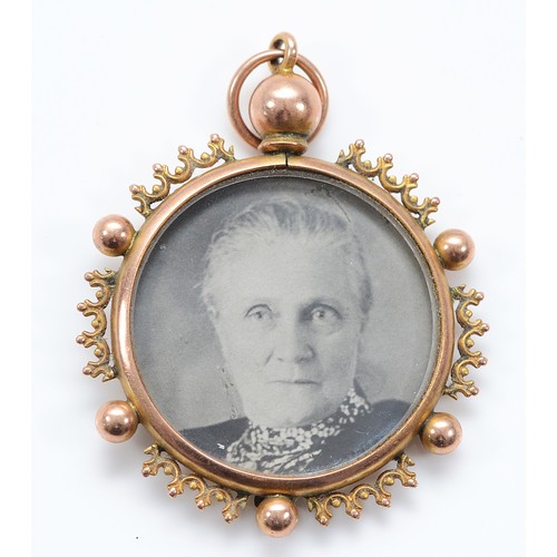 57 - An Edwardian 9ct rose gold double sided locket pendant, 29mm, 5.2g