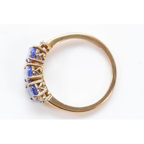 60 - A 9ct gold tanzanite and diamond dress ring, O, 2.3g