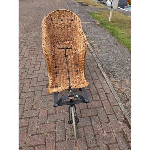  Wickerwork bath chair, with wrought metal frame, early 20th century, solid rubber tyres, spring seat... 