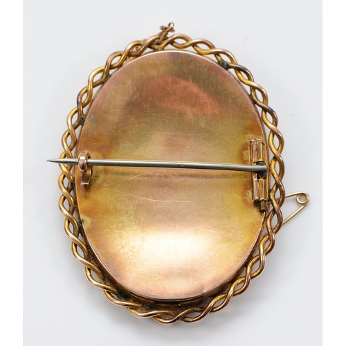  A late 18th/early 19th century gold mounted ivory portrait miniature brooch, in the style of Philip ... 