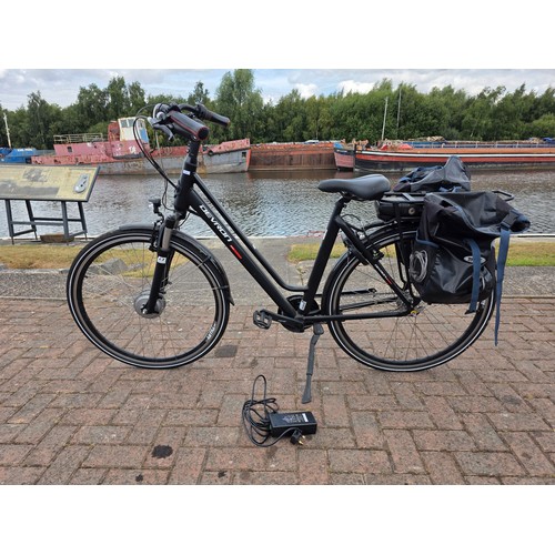 A Devron Marton electric bicycle, front hub drive, 21"/53cm frame, step through design, integrated lights, built in horseshoe lock, side stand, 3 speed hub gears, with panniers, rack and charger. PLEASE NOTE we cannot get the battery to accept charge.