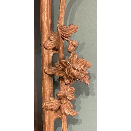 452 - A pair of George III giltwood mirrors, with later plates, each carved with waved pierced rectangular... 