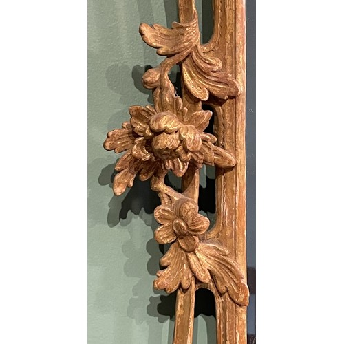 452 - A pair of George III giltwood mirrors, with later plates, each carved with waved pierced rectangular... 