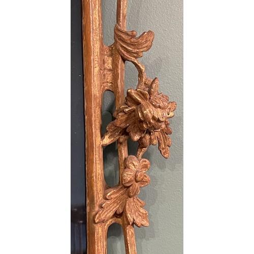 452 - A pair of George III giltwood mirrors, with later plates, each carved with waved pierced rectangular... 