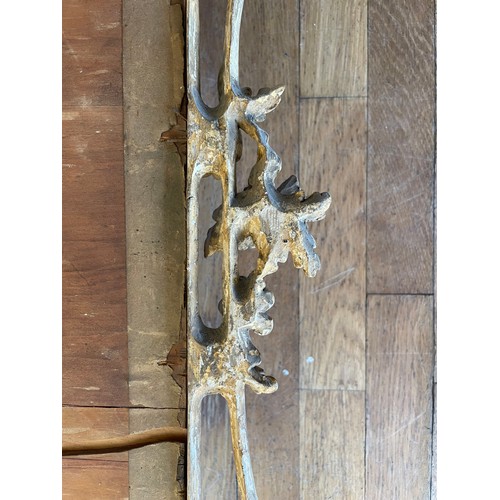452 - A pair of George III giltwood mirrors, with later plates, each carved with waved pierced rectangular... 