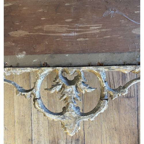 452 - A pair of George III giltwood mirrors, with later plates, each carved with waved pierced rectangular... 