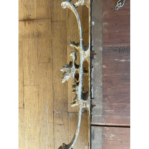 452 - A pair of George III giltwood mirrors, with later plates, each carved with waved pierced rectangular... 