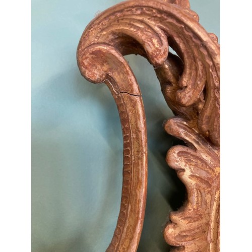 452 - A pair of George III giltwood mirrors, with later plates, each carved with waved pierced rectangular... 