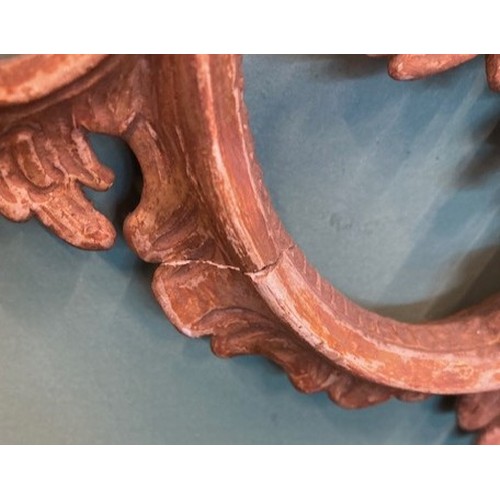 452 - A pair of George III giltwood mirrors, with later plates, each carved with waved pierced rectangular... 