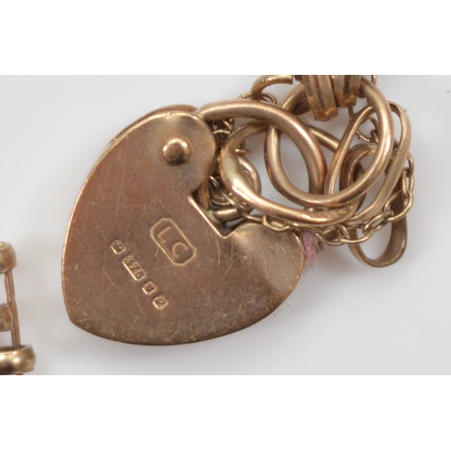 5 - A 9ct gold gate link bracelet with heart shaped padlock clasp, in need of repair, 18cm, 6.5g