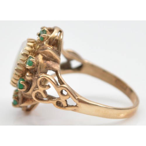 12 - A 9ct gold opal and emerald dress ring, London 1977, hallmarks worn, P, 4.7g