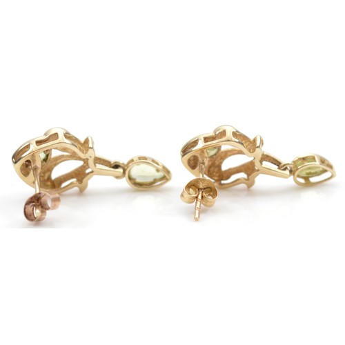 20 - A pair of 9ct gold peridot drop earrings with scroll backs, 20mm, 2.1g