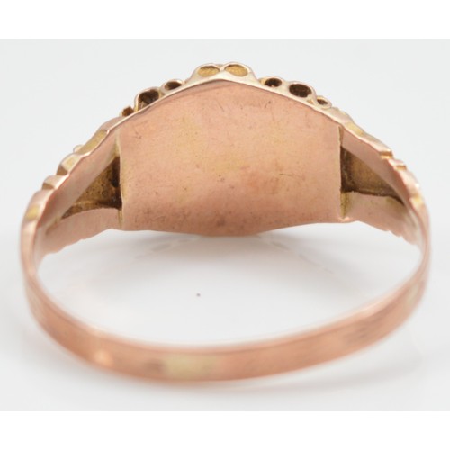 22 - A 9ct gold garnet and seed pearl dress ring, Chester 1912, Hallmarks are worn, Q, 2g