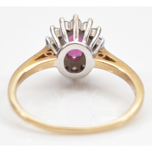 23 - A 9ct gold ruby and single cut diamond cluster ring, stated 0.15ct, M, 2.2g