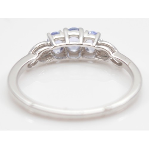 24 - A 10K white gold tanzanite and single cut diamond dress ring, N, 1.7g