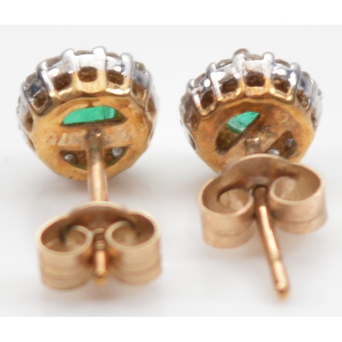25 - A pair of 9ct gold emerald and brilliant cut diamond earrings with scroll backs, 0.8g