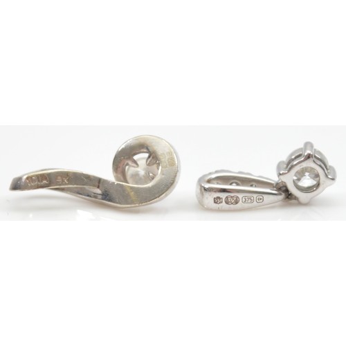 35 - Two 9ct white gold brilliant cut diamond pendants, 1.2g