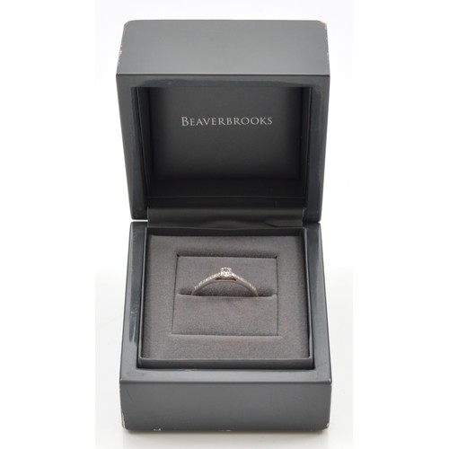 37 - An 18ct white gold brilliant cut diamond solitaire ring, stated weight 0.15ct, with brilliant cut di... 