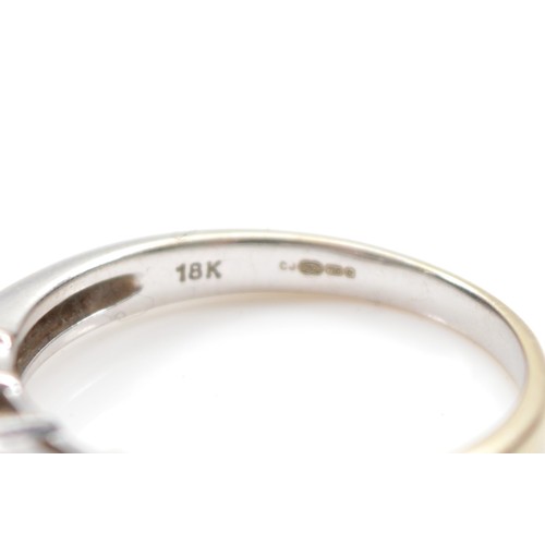 42 - An 18ct white gold Princess cut diamond dress ring, claw set with four stones of approximately 0.15c... 