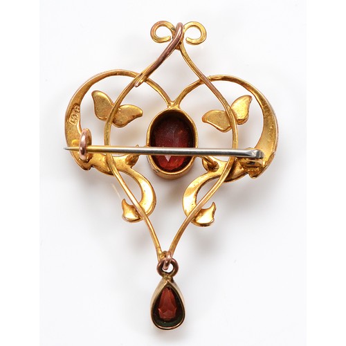 49 - A Victorian 9ct gold garnet and seed pearl brooch, with pendant loop, 9ct tab to the rear, 40mm, 3.6... 