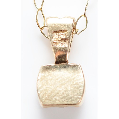 52 - A 9ct gold brilliant cut diamond pendant on a chain, approximately 0.33ct, 1.1g