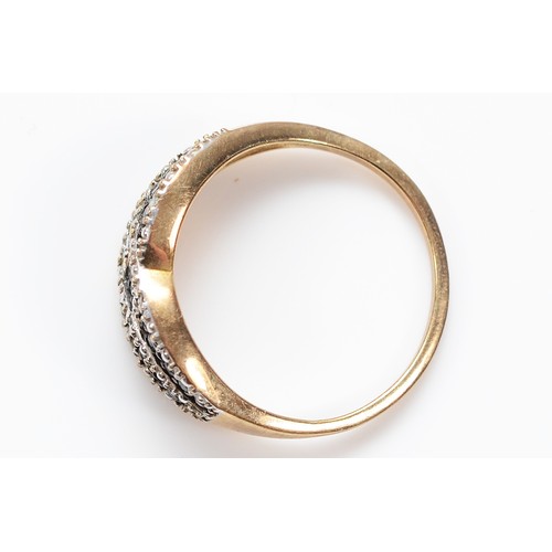 57 - A 9ct gold single cut diamond dress ring, with black diamonds to the centre of the pattern, stated 0... 
