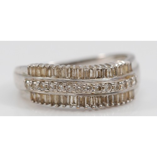 59 - A 9ct white gold vari cut diamond three row dress ring, M, 2.6g