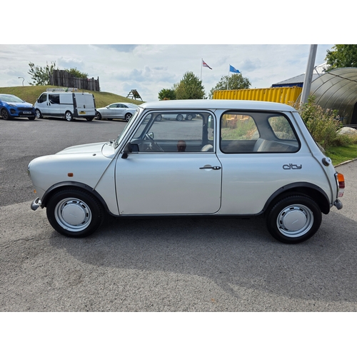 258 - 1986 Mini City E, 998cc. Registration number D853 UJM. VIN number SAXXL2S1020324519. Engine number 9... 