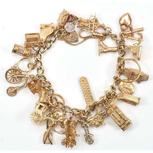 A 9ct gold charm bracelet, with multiple charms, including a Penny Farthing, Punch and Judy, a chopper motorcycle and a vintage car, 78.6gm