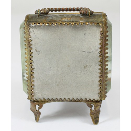 15 - A small metal and glass jewellery display case, with carry handle, 10cm