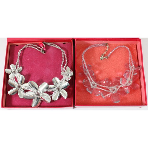 17 - Butler & Wilson, two floral necklaces, purple and silver coloured, with boxes