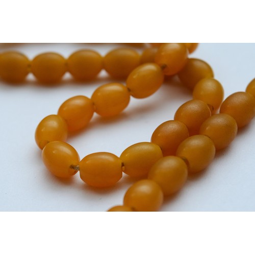 54 - A Bakelite beaded necklace, graduating size beads, largest bead 22mm, screw closure, 95cm, 65g