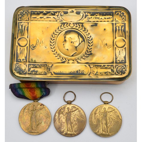 A WWI brass Queen Mary 1914 Christmas tin, 13 x 8.5cm, together