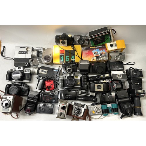 9 - 2 boxes of film cameras to include movie cameras, box cameras, Kodak Instamatics, accessories and mo... 