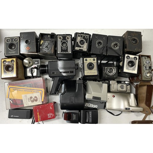 9 - 2 boxes of film cameras to include movie cameras, box cameras, Kodak Instamatics, accessories and mo... 