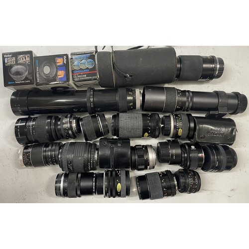17 - A box of camera lens to include a Miranda 1:4.5-5.6 lens, a Nikon AF Nikkor 28-80mm lens, a Minolta ... 
