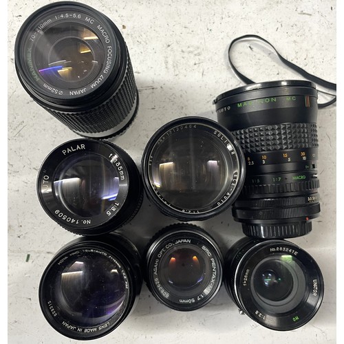 25 - A box of camera lens to include a Nikkor-Q Auto 1:4 200mm lens, a Hanimex 300mm 1:5.6 mirror lens, a... 