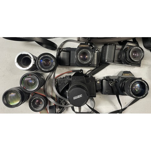 35 - A collection of film cameras to include a Canon T50, a Cano T70, a Chinon CP-7m and others. (1 box)