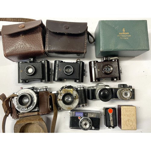 59 - A collection of miniature cameras to include makes, Toyoca Ace, Sida and Eljy Lumiere. (One box).... 