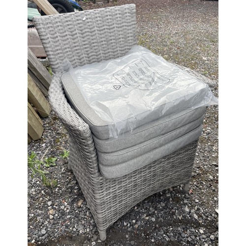 11 - A garden patio dining set made by Lifestyle Garden, large round table with four chairs in synthetic ... 