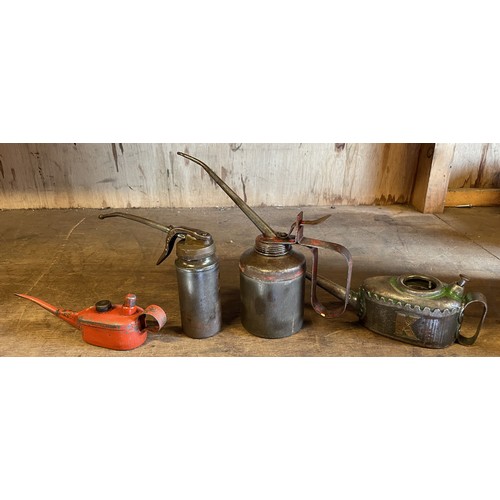 18 - Two boxes of mixed hand tools to include, four oil cans, a joiners brace and boxed trestle dogs.