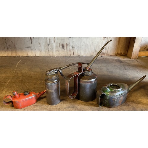 18 - Two boxes of mixed hand tools to include, four oil cans, a joiners brace and boxed trestle dogs.