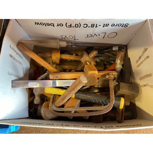 19 - A large quantity of mixed hand tools in four boxes, items to include, saws, an Elwell cleaver and pe... 
