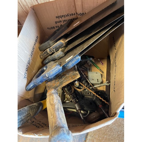 19 - A large quantity of mixed hand tools in four boxes, items to include, saws, an Elwell cleaver and pe... 